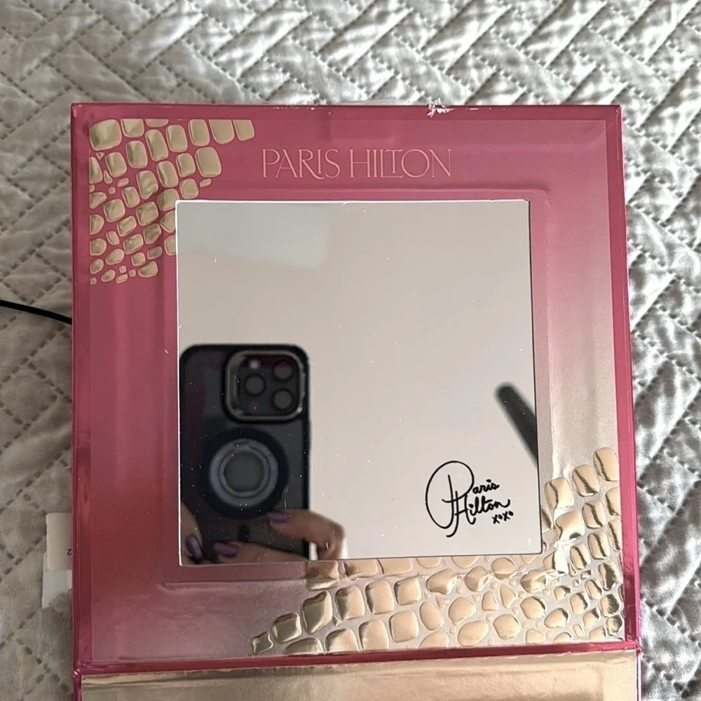 Paris Hilton enhance your